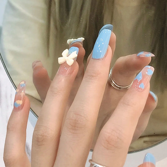 Spring Blossom Medium Coffin Blue Press On Nail Set with Floral Accents and Glitter Highlights