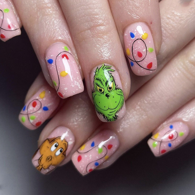 Whimsical Holiday Medium-Length Oval Pink Press On Nail Set with Cheerful Cartoon Characters Design