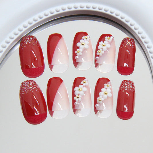 Chic Romance Short Coffin Red Nail Set with Floral Accents and Glitter Finish