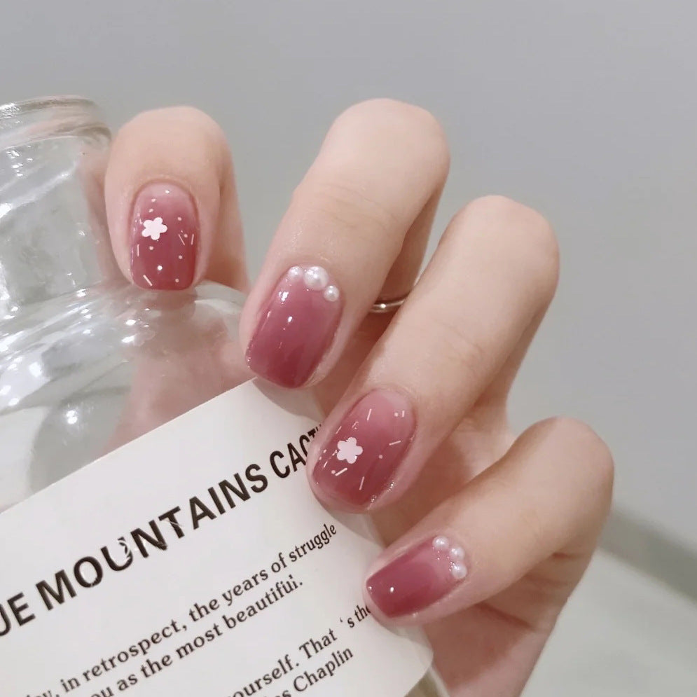 Elegant Sakura Blossom Short Round Mauve Press On Nails with Floral Accents and Pearl Embellishments
