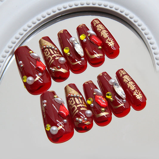 Festive Elegance Medium Coffin Deep Red Nail Set with Stunning Gemstone Embellishments