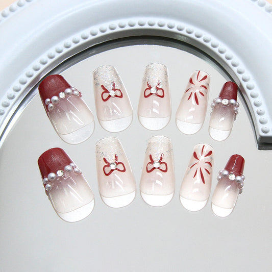 Festive Glamour Medium Coffin Burgundy and Off White Pearl Accented Press On Nail Set with Charming Bow Designs