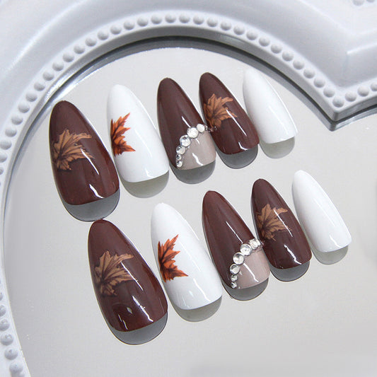 Autumn Elegance Medium Almond Brown White and Leaf Design with Sparkling Accents Nail Set