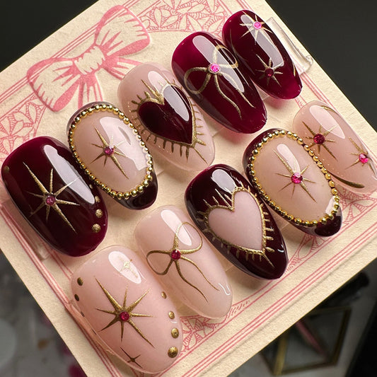 Glamorous Romance Short Almond Burgundy and Pink Press On Nail Set with Sparkling Heart and Gold Detailing