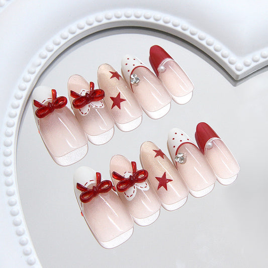 Whimsical Holiday Delight Medium Almond Shape Clear Pink with Red Bows and Star Accents Press On Nail Set