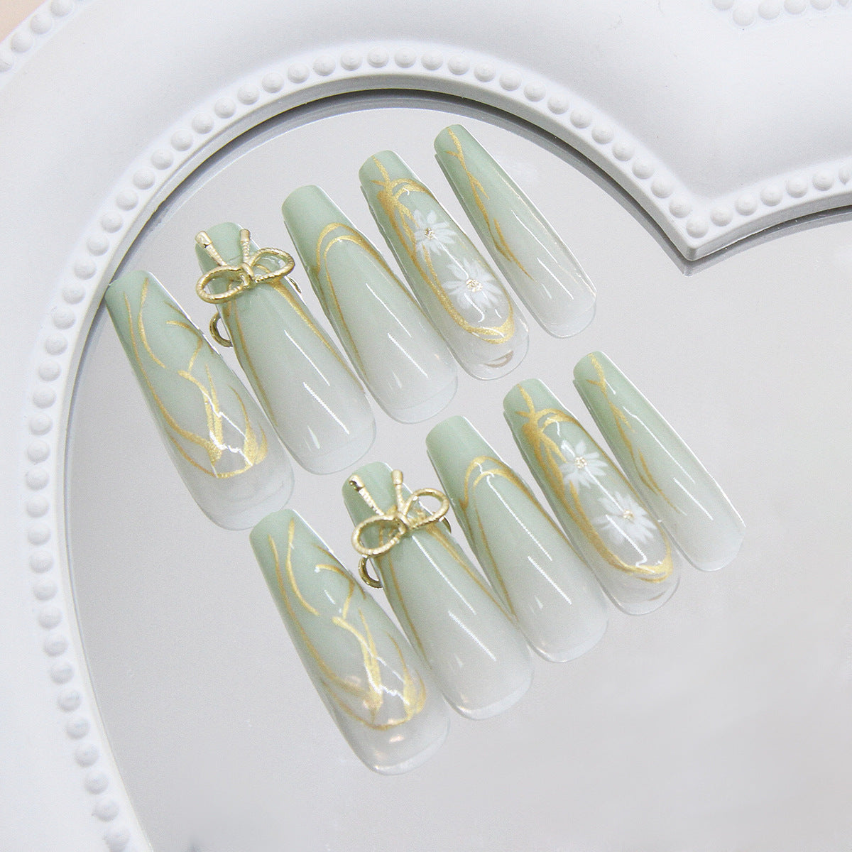 Whimsical Elegance Long Coffin Mint Green Press On Nail Set with Delicate Gold Accents and Floral Design