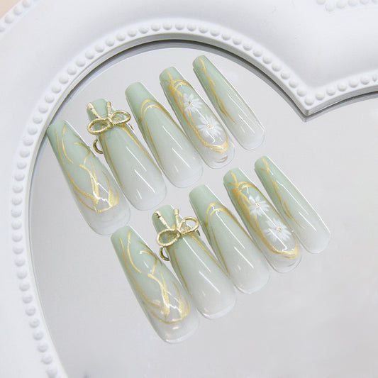 Whimsical Elegance Long Coffin Mint Green Press On Nail Set with Delicate Gold Accents and Floral Design