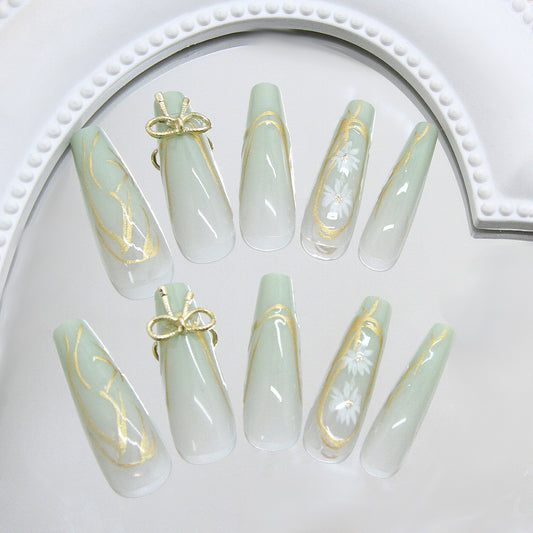 Whimsical Elegance Long Coffin Mint Green Press On Nail Set with Delicate Gold Accents and Floral Designs