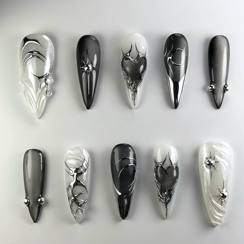 Mystical Elegance Long Stiletto Acrylic Nail Set in Black and White with Metallic Accents
