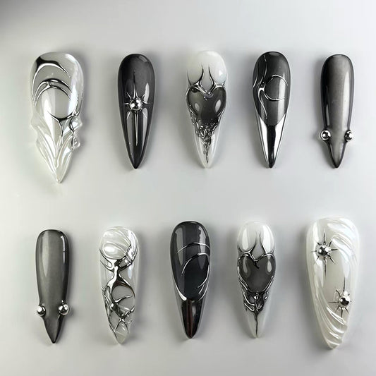 Mystical Elegance Long Stiletto Acrylic Nail Set in Black and White with Metallic Accents