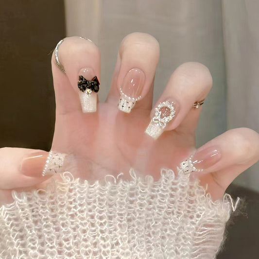 Charming Winter Wonderland Long Coffin White Press on Nail Set with Adorned Bow and Glittering Accents