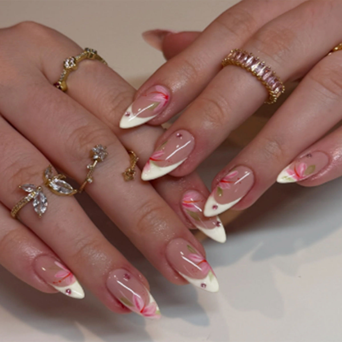 Floral Fantasy Medium Almond Press On Nail Set in Glossy Beige with Elegant Floral Accents and Gemstone Embellishments