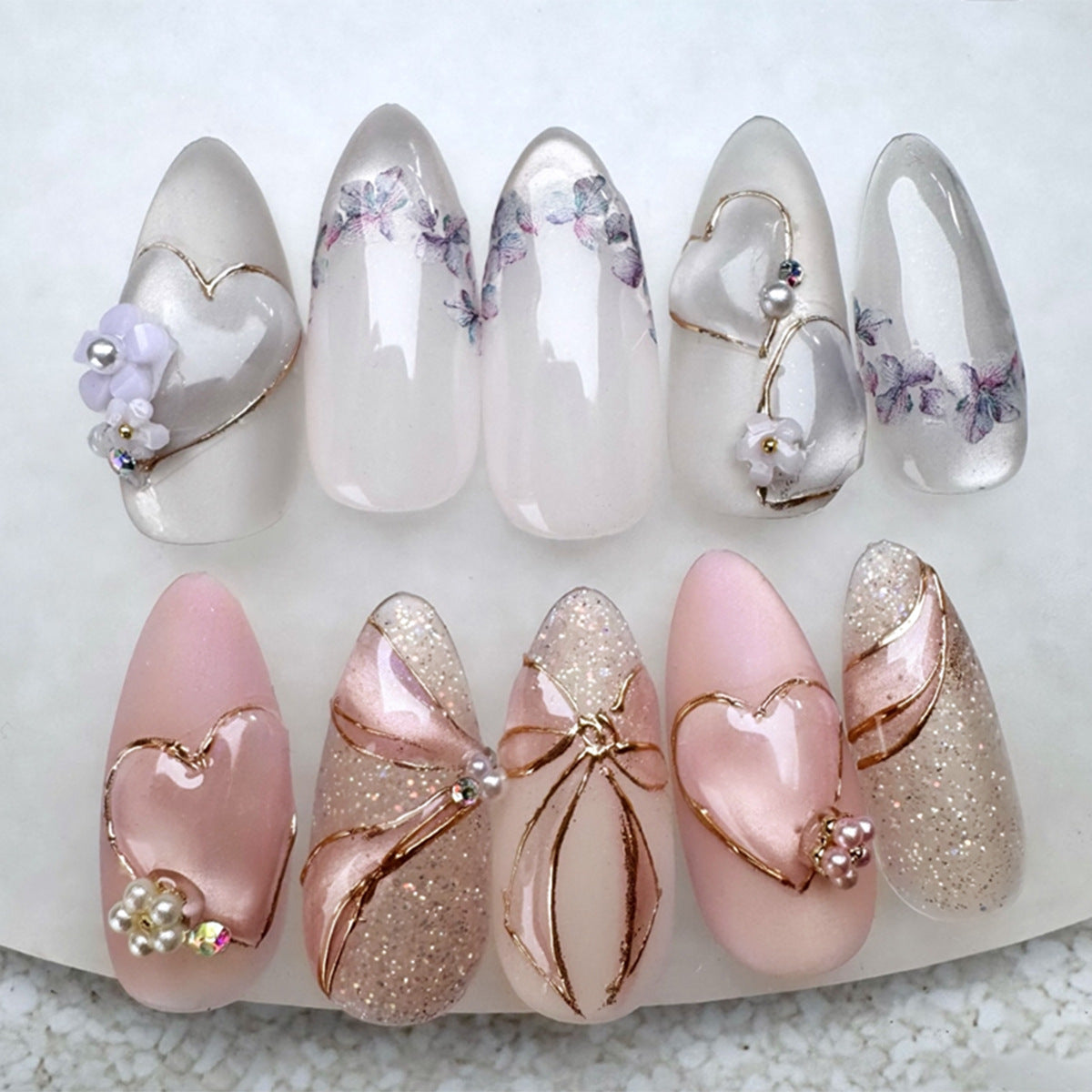 Charming Romance Press On Nail Set Long Almond Shape Elegant White and Pink with Heart and Floral Embellishments