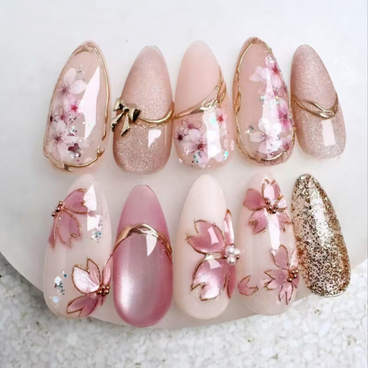 Blossom Elegance Medium Almond Pink Floral Press On Nail Set with Stunning Gold Accents