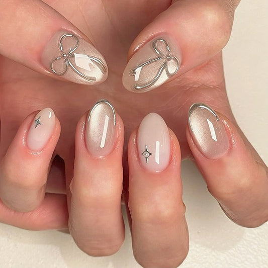 Chic Elegance Short Oval Press on Nails in Soft Beige with Dazzling Metallic Accents