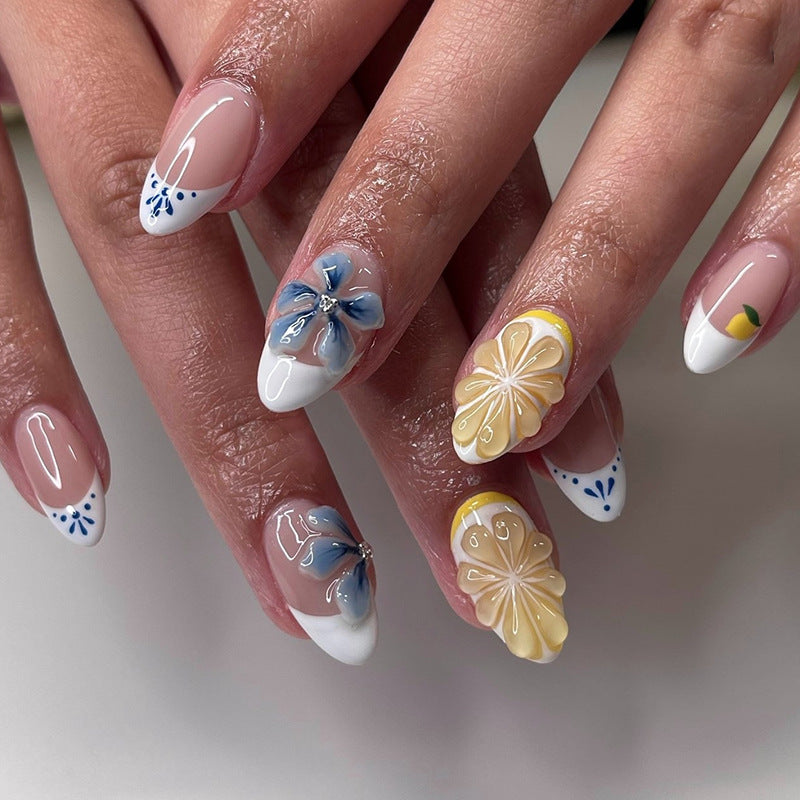 Tropical Blossom Elegant Medium Almond Press On Nail Set Featuring Vibrant Floral Art and Chic French Tips