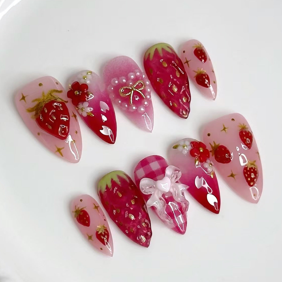 Sweet Strawberry Fantasy Medium Stiletto Pink Nail Set with Charming Fruit and Pearl Accents