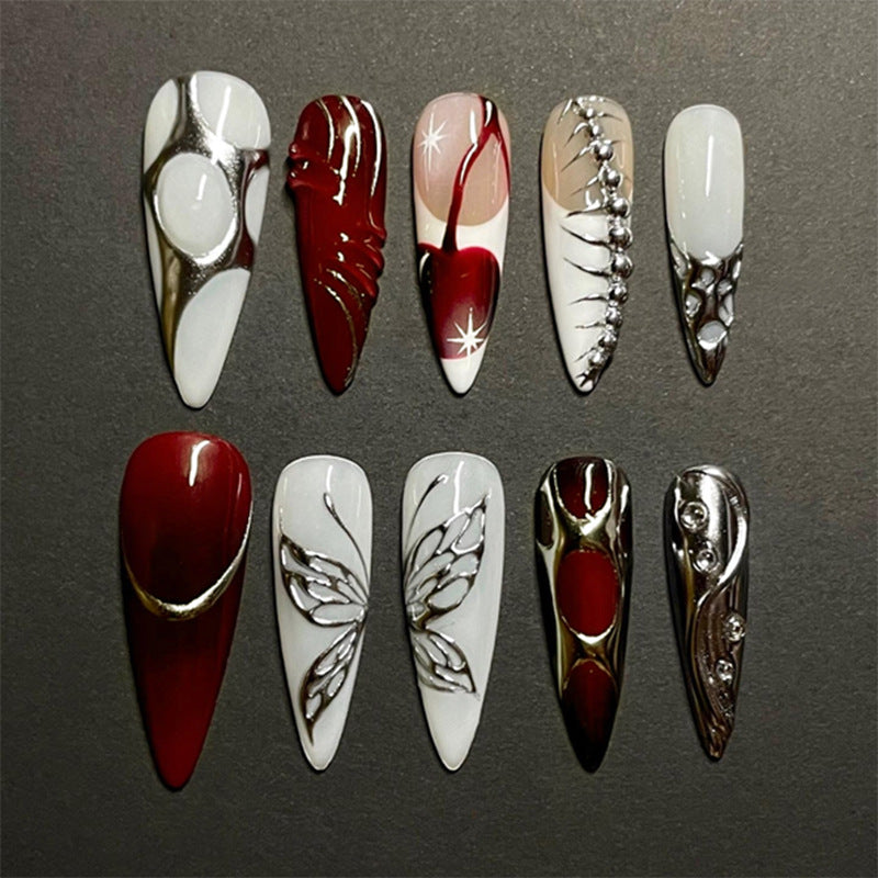 Gothic Elegance Long Stiletto Red and White Press On Nail Set with Intricate Metallic Design and Butterfly Accents