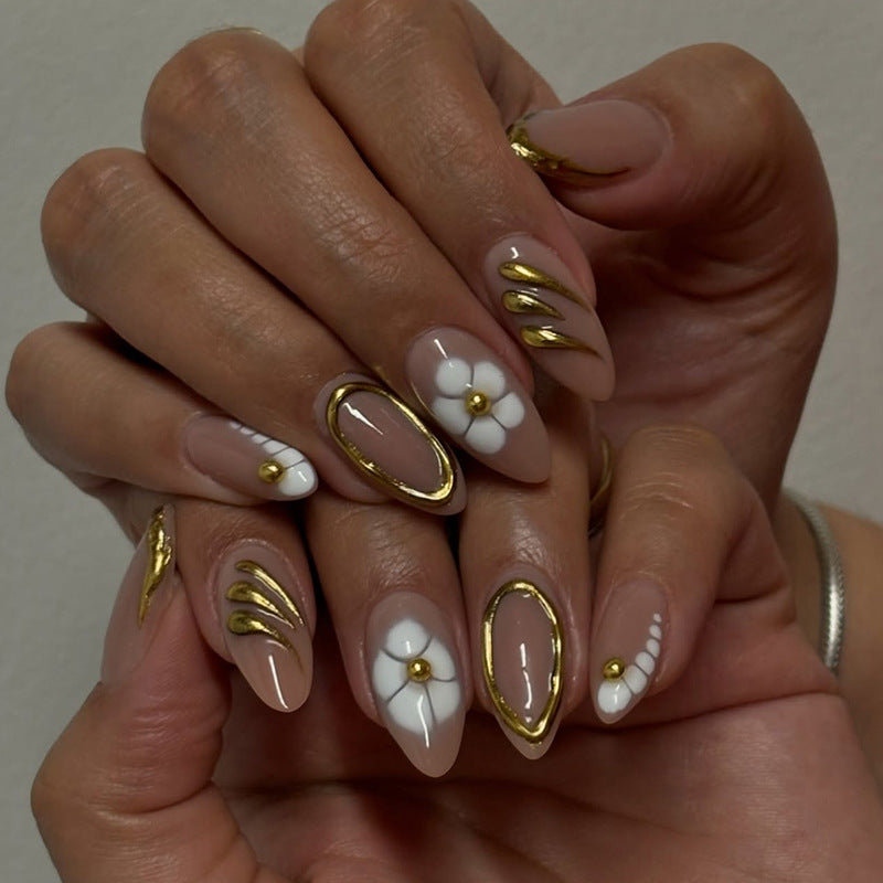 Chic Glamour Medium Almond Shaped Beige Press On Nails with Elegant Gold Accents and Floral Design