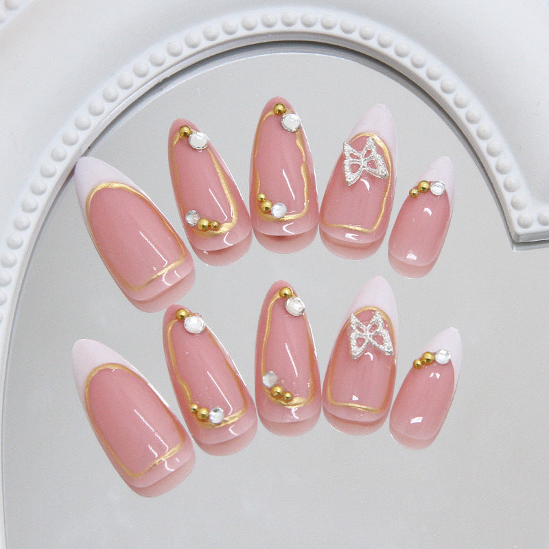Glamorous Elegance Long Almond Shaped Blush Pink Press On Nail Set with Gold Accents and Butterfly Design