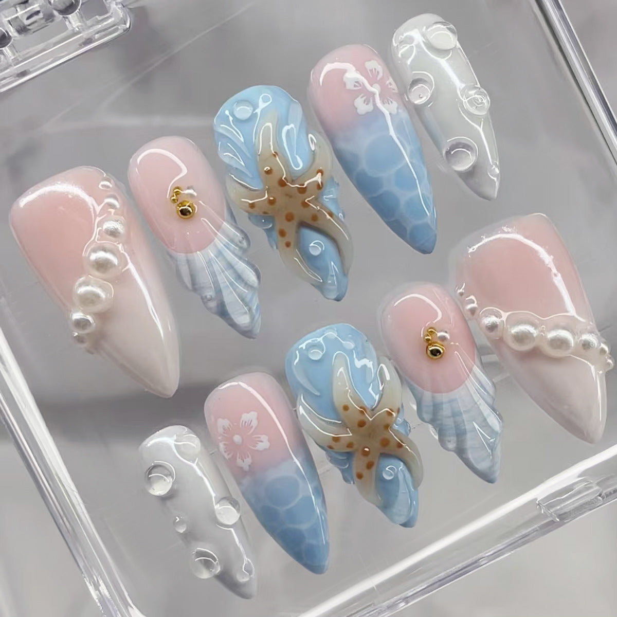 Ocean Breeze Inspired Long Almond Pink and Blue Press-On Nail Set Featuring Elegant Pearl and Octopus Designs