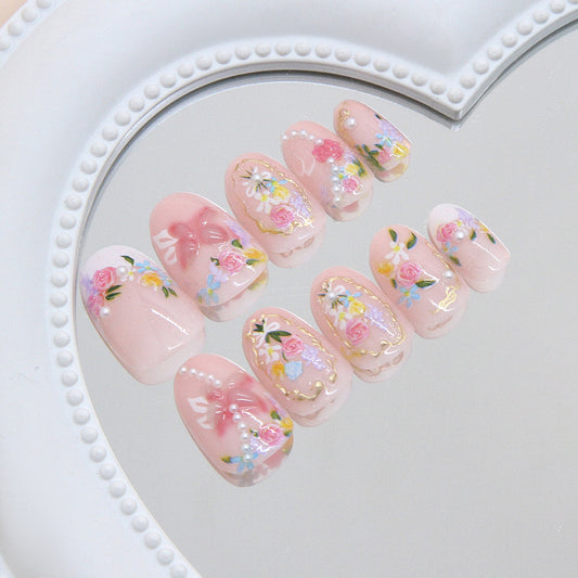 Whimsical Floral Dream Short Oval Pink Nail Set with Charming Pearl Accents