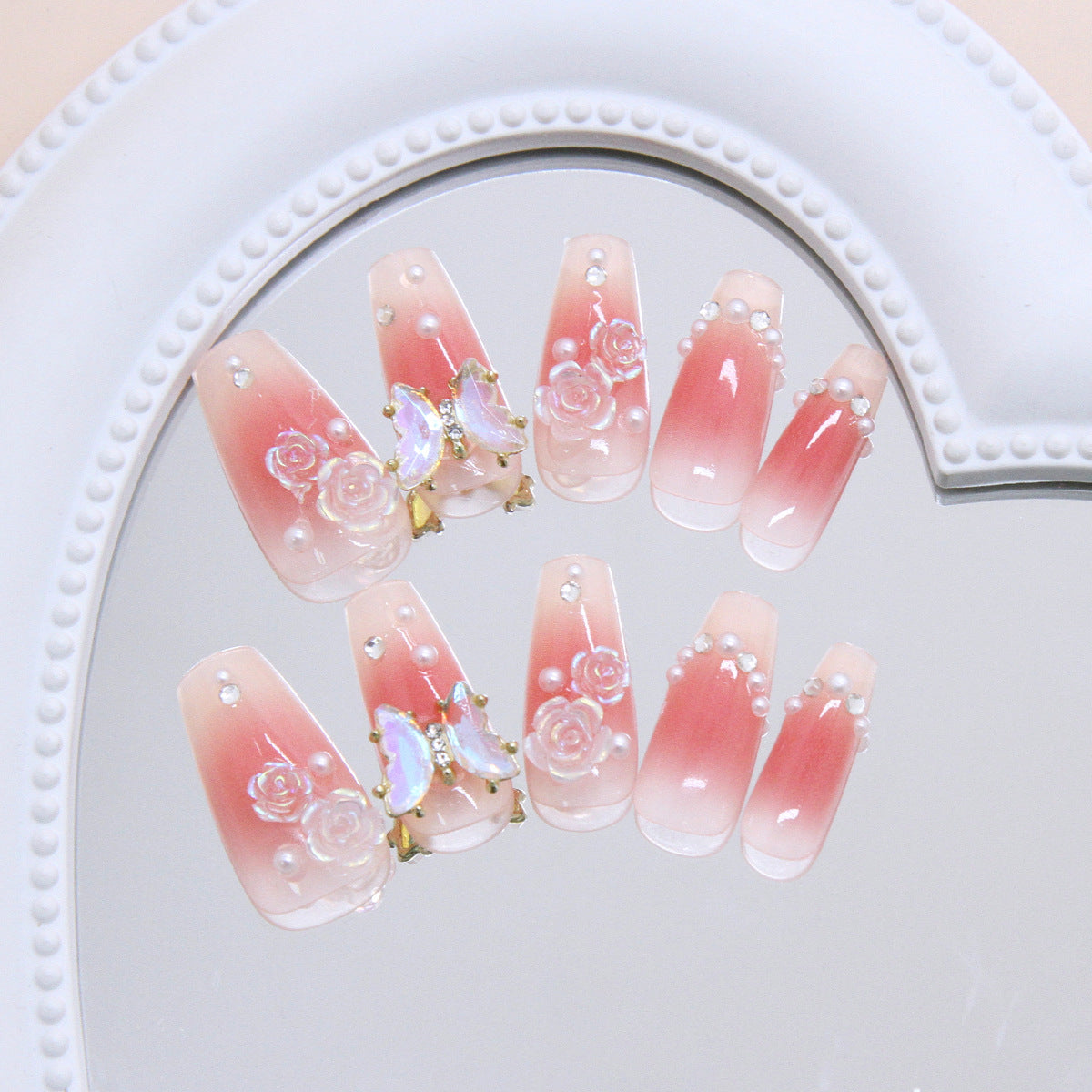 Romantic Blossom Long Coffin Gradient Pink Nails with Floral and Pearl Accents