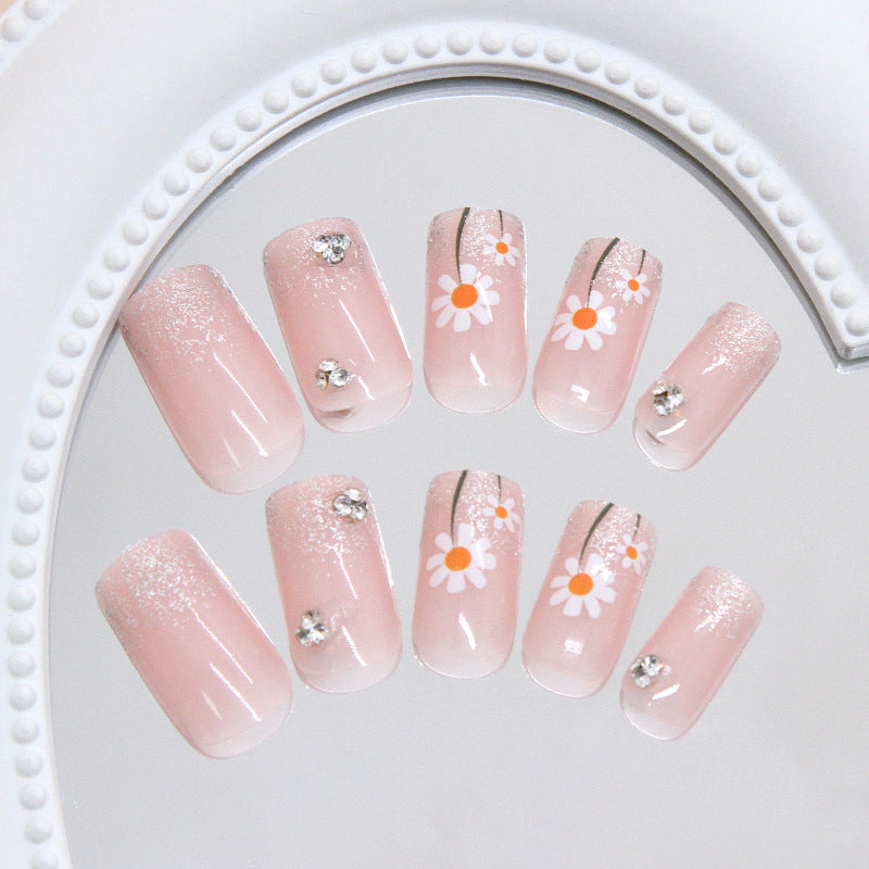 Whimsical Floral Delight Long Square Pink Nail Set with Glitter and Gem Accents
