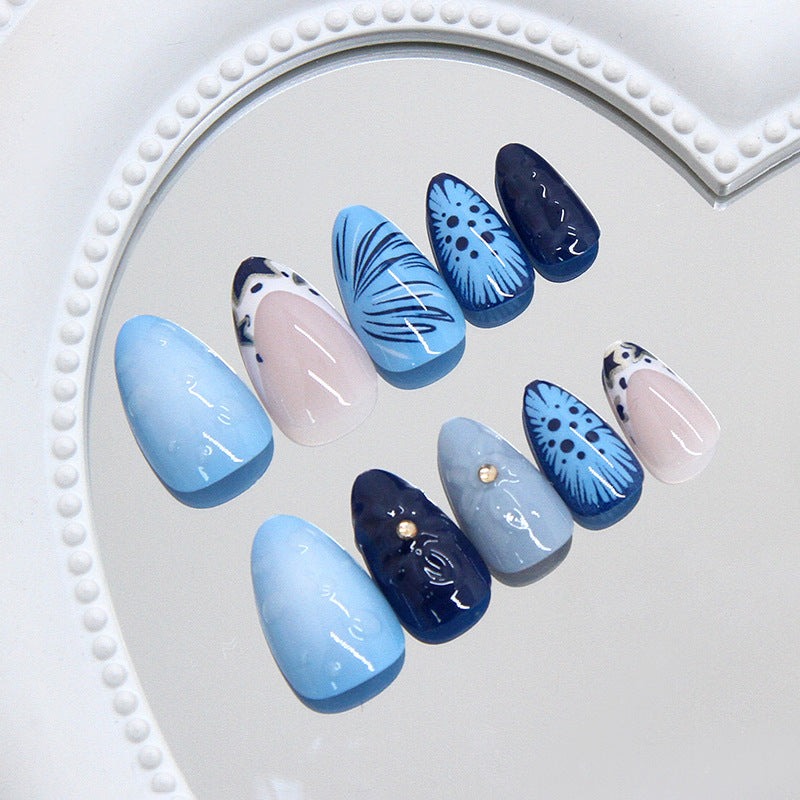 Ocean Breeze Elegant Medium Almond Shaped Blue Ombre Press On Nail Set with Unique Floral Design