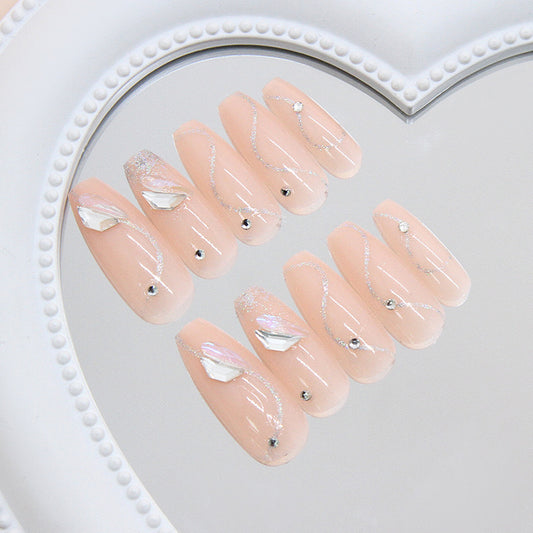 Dreamy Elegance Long Coffin Blush Pink Nails with Dazzling Gem Accents and Shimmering Waves