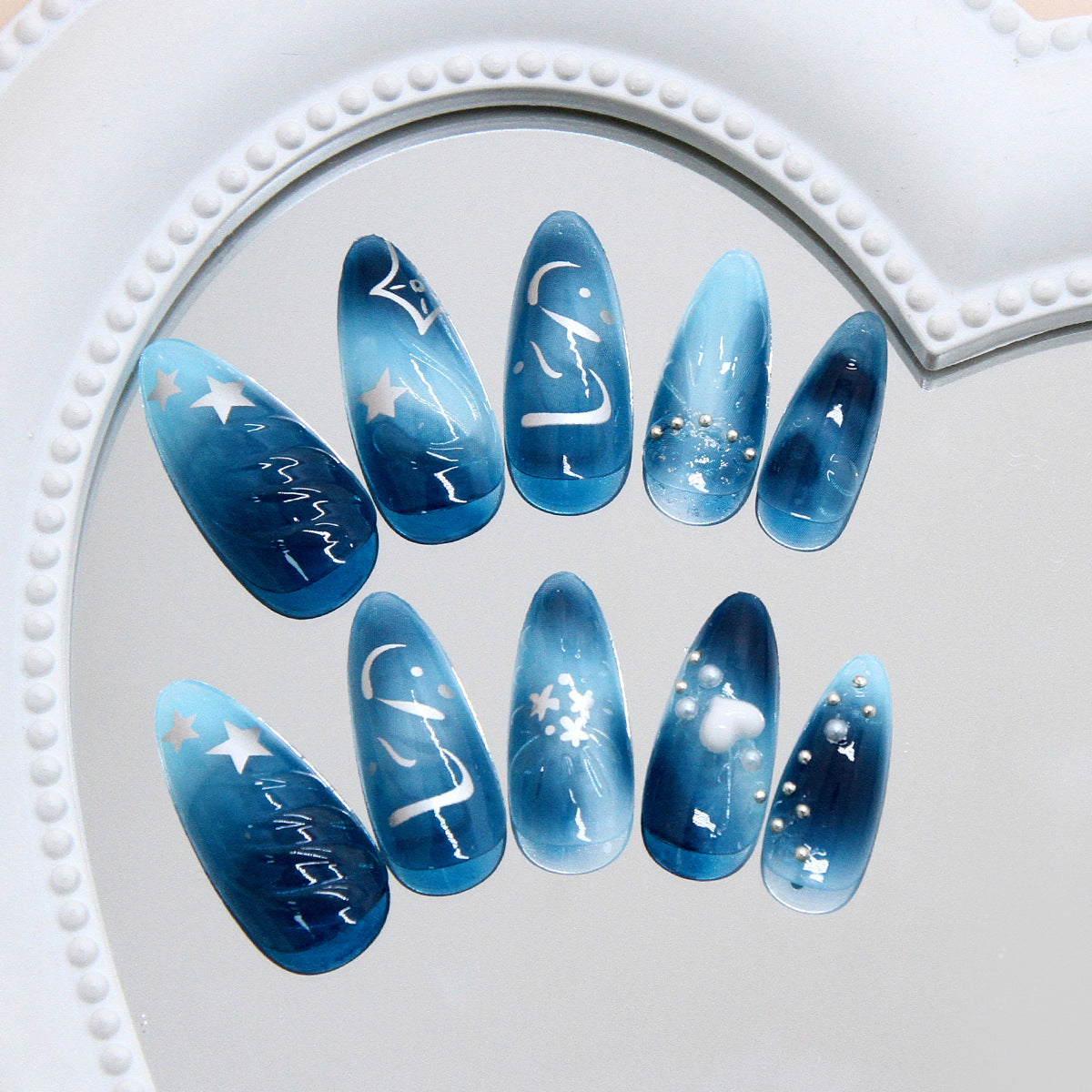 Celestial Dreamscape Long Almond Blue Gradient Nail Set with Starry Accents and Beautiful Pearls