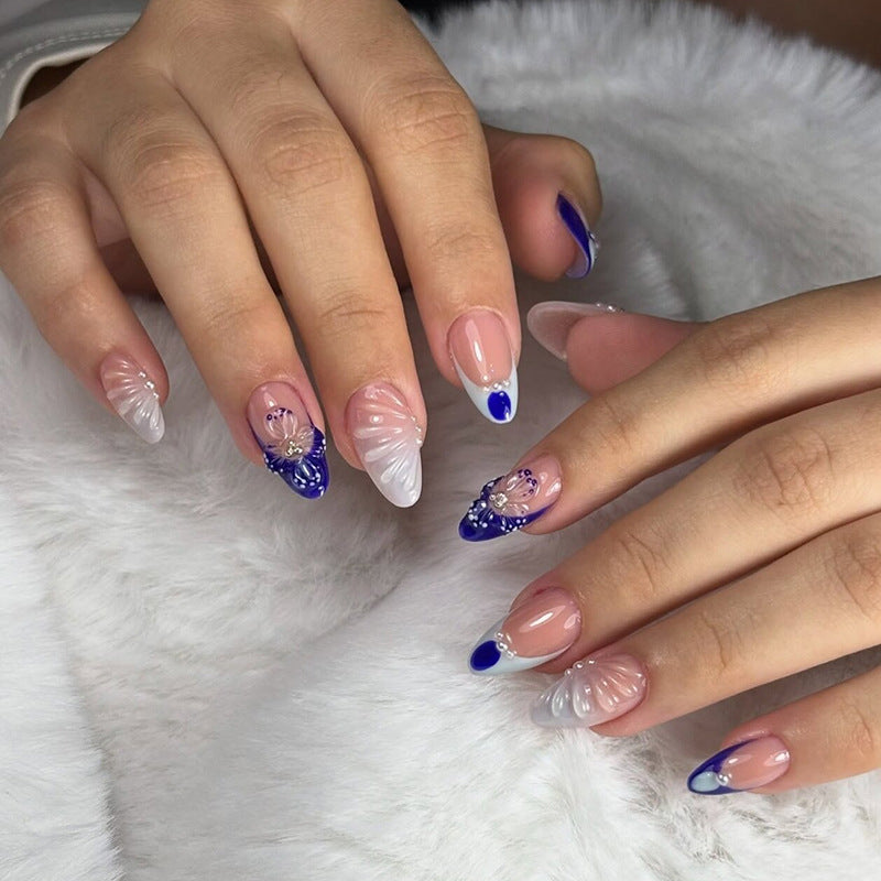 Oceanic Elegance Medium Almond Blue and White Marble Design with Floral Accents Press-on Nail Set