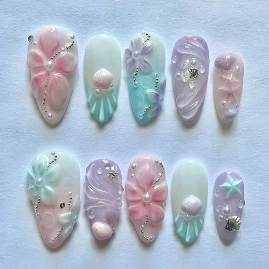 Dreamy Oceanside Floral Ombre Medium Almond Pink and Blue Press-On Nail Set with Unique Texture and Shell Accents