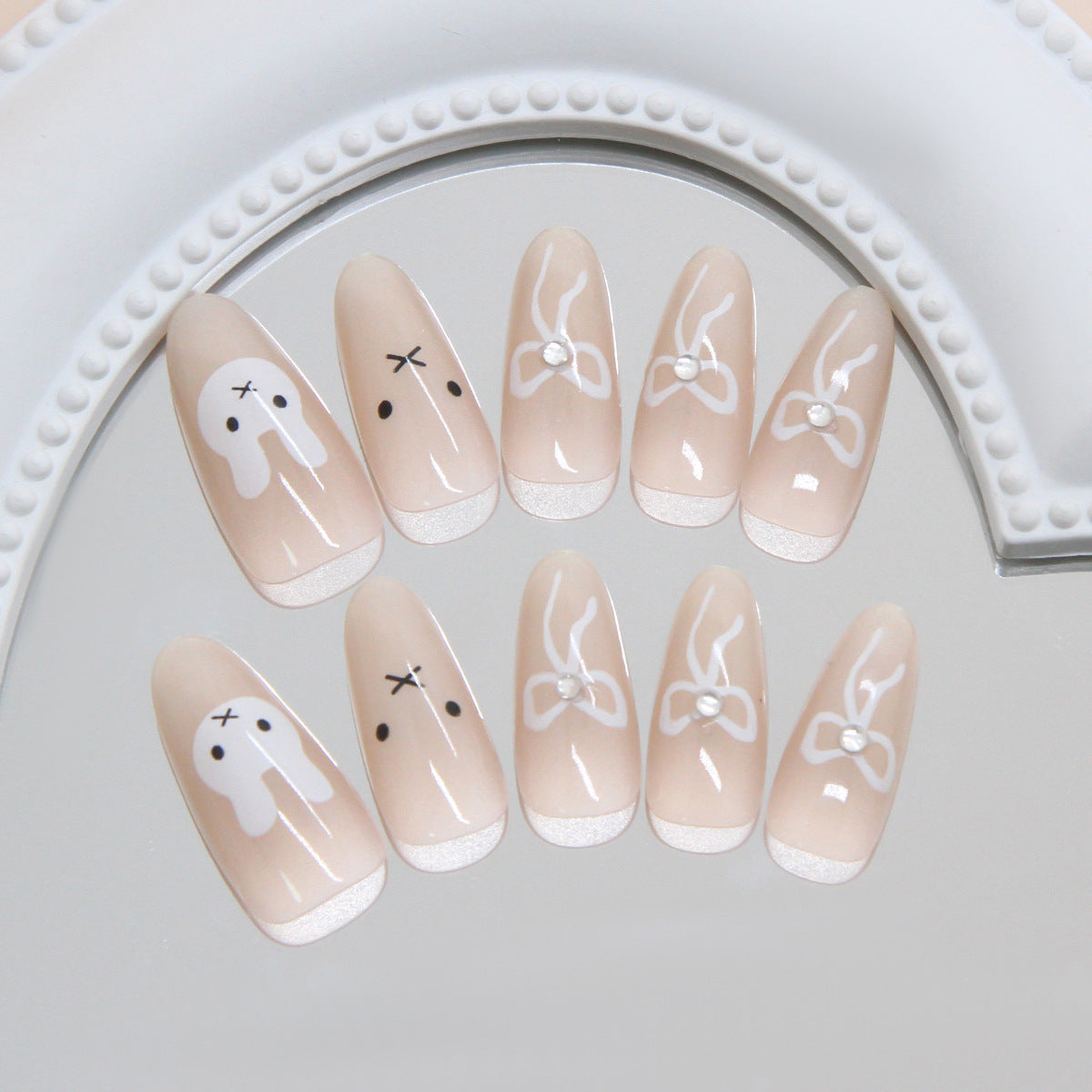 Whimsical Wonderland Long Almond Beige with Playful Bunny Designs and Elegant Bow Accents Press On Nail Set