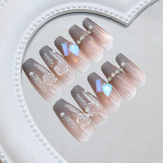 Whimsical Elegance Long Coffin Shaped Soft Pink Deluxe Nail Set with Floral Accents and Shimmering Gems