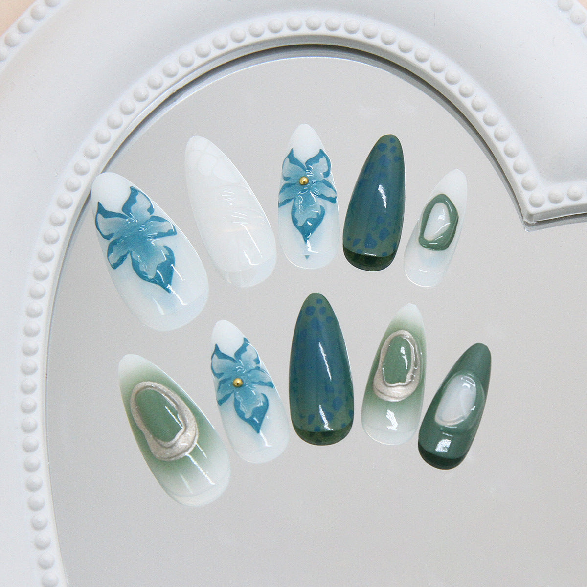 Nature's Whisper Elegant Medium Almond Green and White Press On Nail Set with Floral Accents and Unique Textured Stones