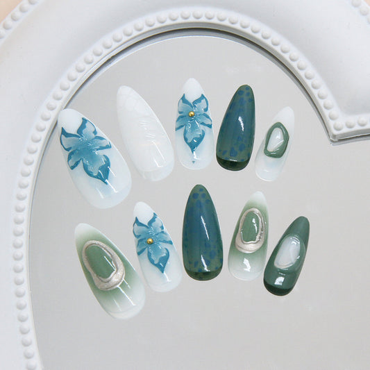 Nature's Whisper Elegant Medium Almond Green and White Press On Nail Set with Floral Accents and Unique Textured Stones