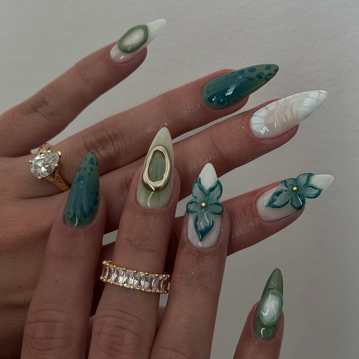 Tropical Oasis Long Almond Green and White Nail Set with Unique Floral and Textured Designs