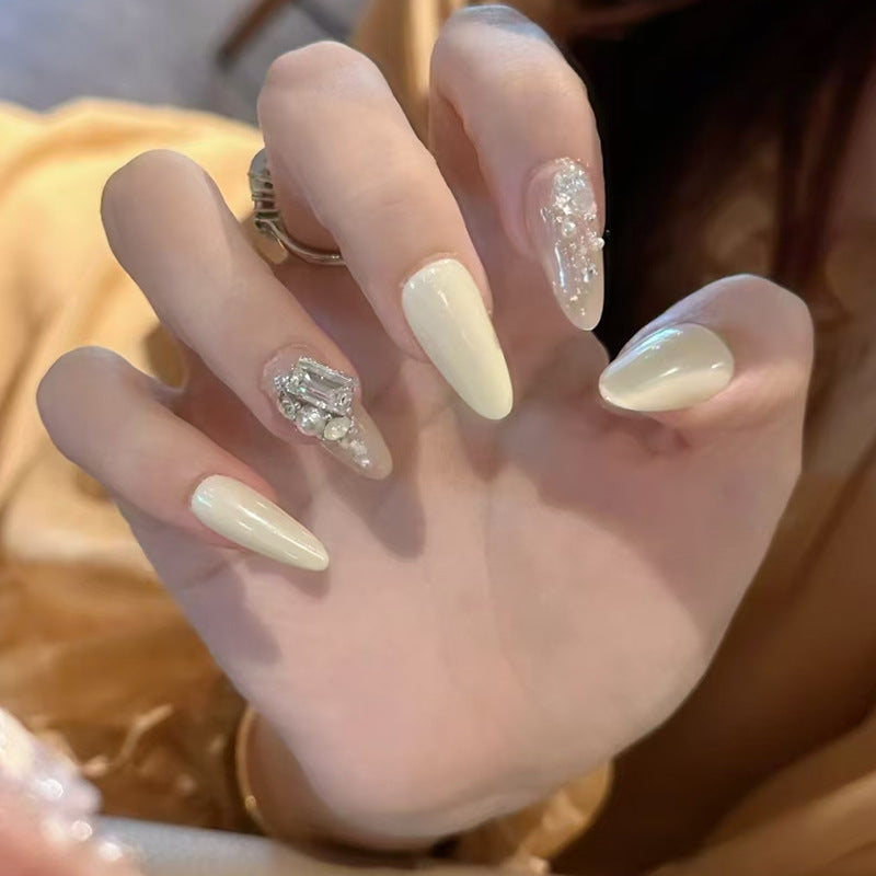 Elegance Unleashed Long Almond Ivory Press On Nail Set with Sparkling Embellishments