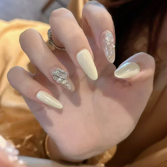 Elegance Unleashed Long Almond Ivory Press On Nail Set with Sparkling Embellishments