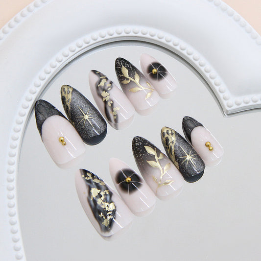 Mystical Nightfall Long Almond Shaped Black and Beige Press On Nail Set with Glitter and Intricate Gold Detailing