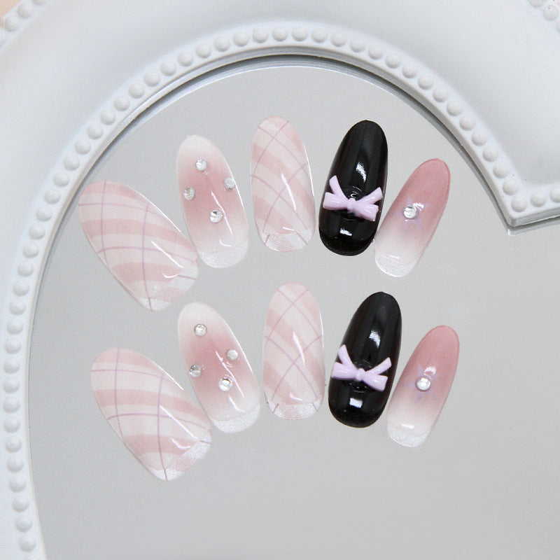 Chic Elegance Long Oval Blush and Black Press On Nail Set with Bow and Gem Accents