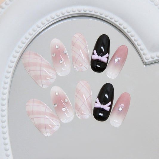 Chic Elegance Long Oval Blush and Black Press On Nail Set with Bow and Gem Accents