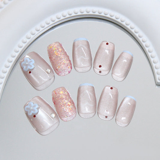 Whimsical Blooms Medium Square Beige Nails with Sparkling Accents and Floral Embellishments