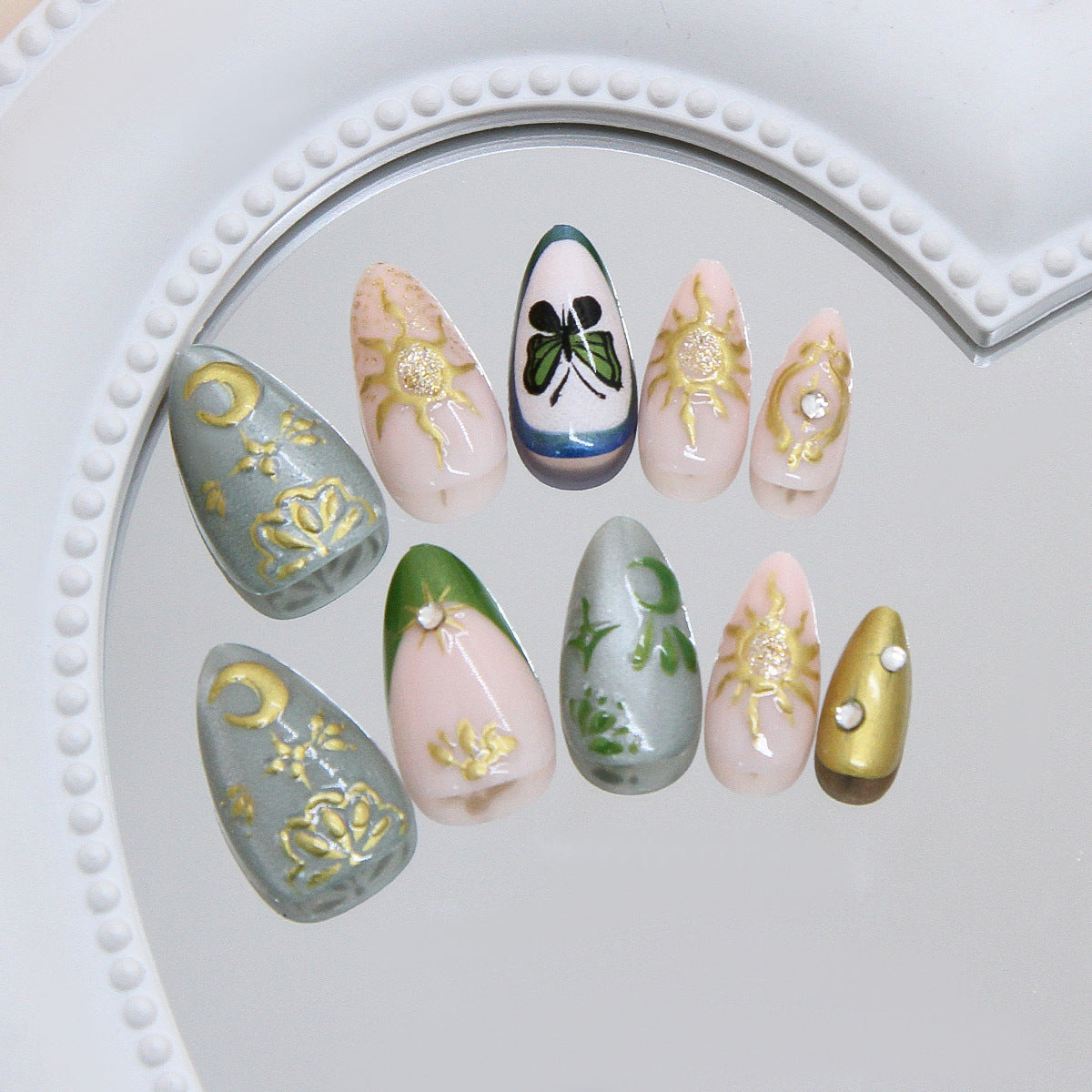 Celestial Glamour Elegant Long Almond Shape Soft Pastel Green and Pink with Intricate Gold Detailing Nail Set