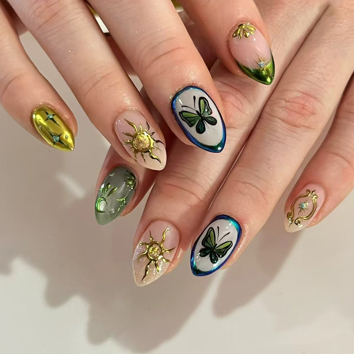 Enchanted Garden Long Almond Shaped Green and Gold Press On Nail Set with Nature Inspired Artistry
