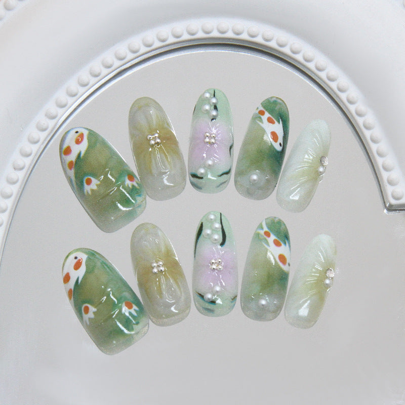 Serene Nature Inspired Long Oval Shaped Green with Floral Accents and Pearl Embellishments Press On Nail Set