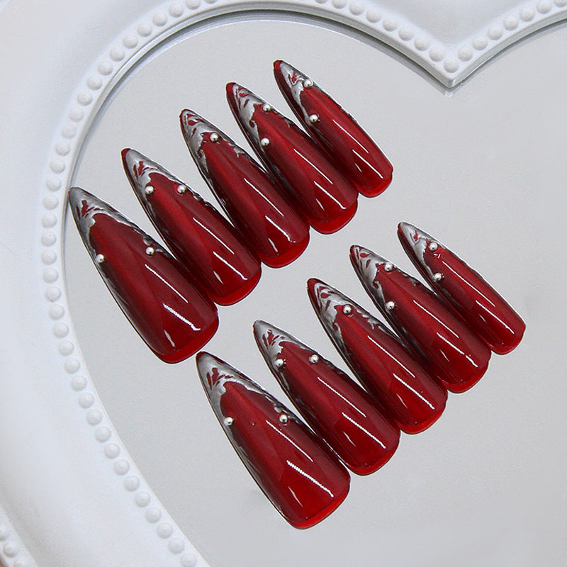 Glamourous Enchantment Long Stiletto Burgundy Glossy Nails with Elegant Silver Accents