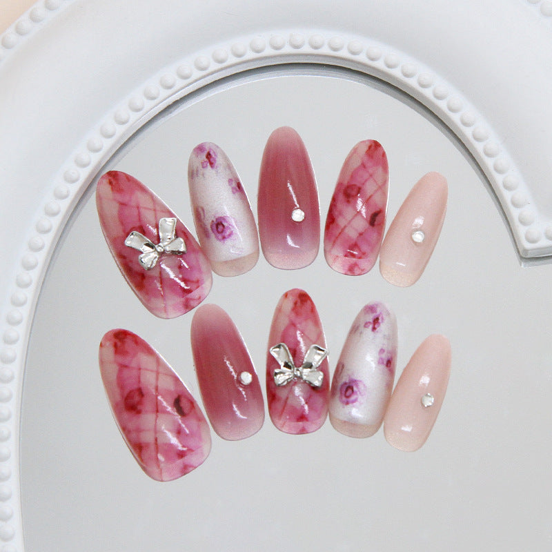 Blossoming Elegance Long Almond Pink Ombre with Sparkling Rhinestones and Charming Bow Accents Press on Nail Set