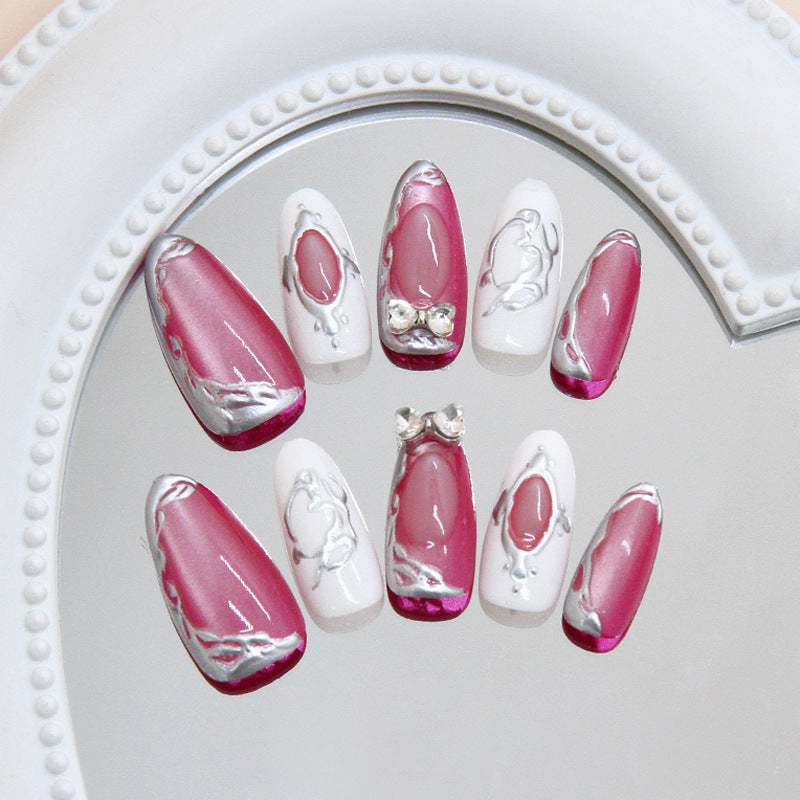 Chic Elegance Long Almond Pink and White Nails with Silver Accent and Gem Details